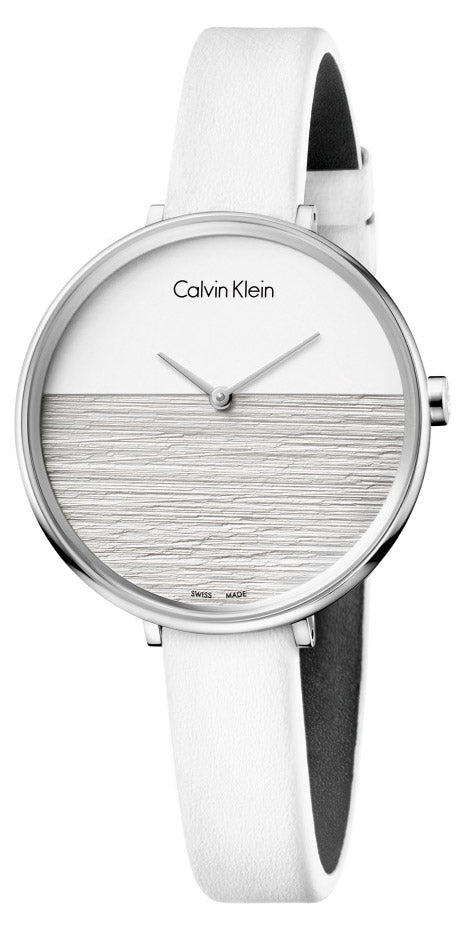 Calvin Klein Rise white dial watch with white leather strap, angled view