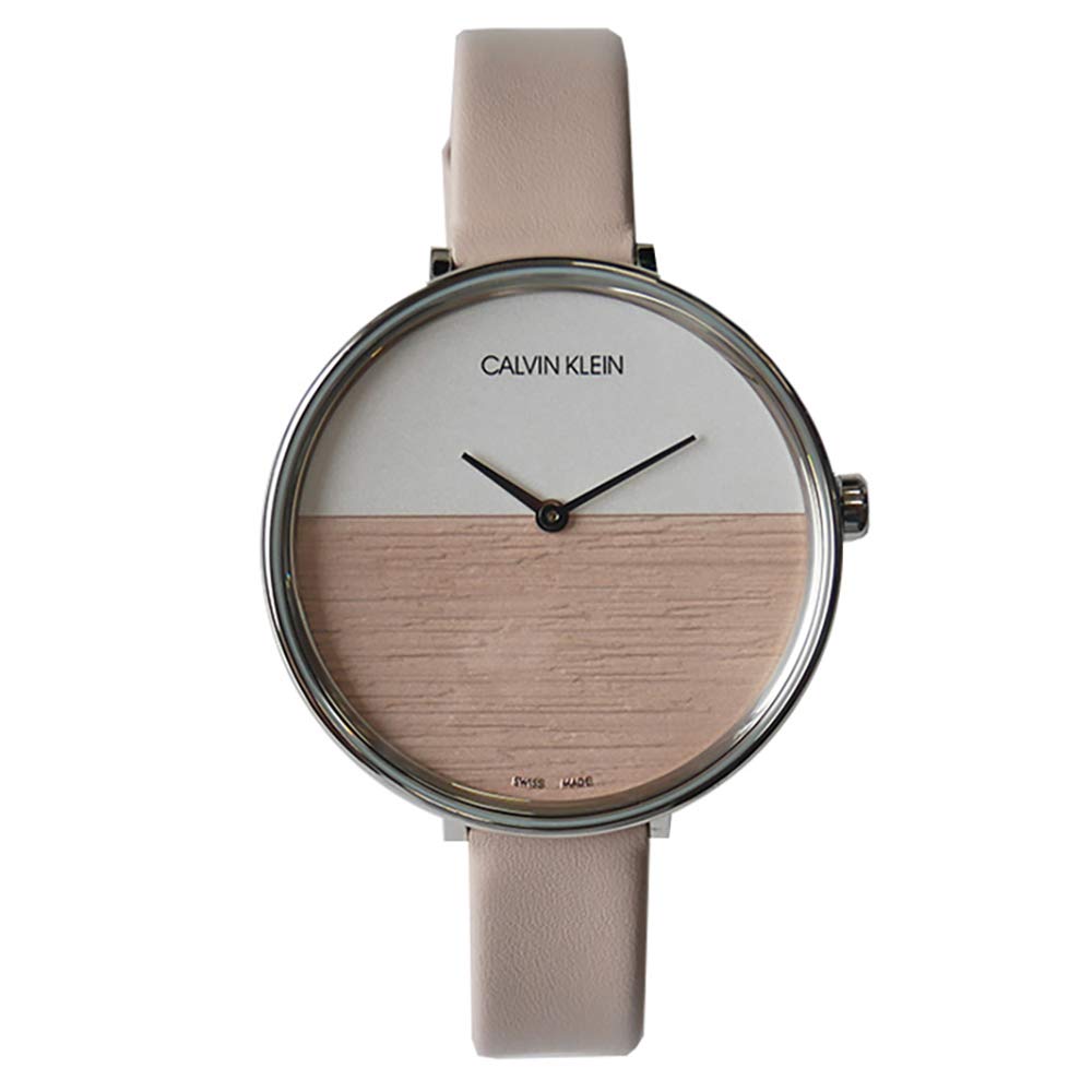 Calvin Klein Rise women's watch on wrist with cream leather band