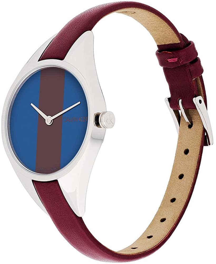 Calvin Klein Rise K8P231UN women's quartz watch worn on wrist with burgundy leather strap