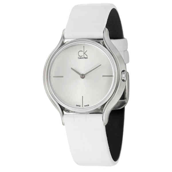 Side angled view of Calvin Klein Skirt watch showing white crocodile-embossed leather strap