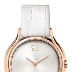 Close-up of Calvin Klein Skirt watch dial showing white face with rose gold hour markers