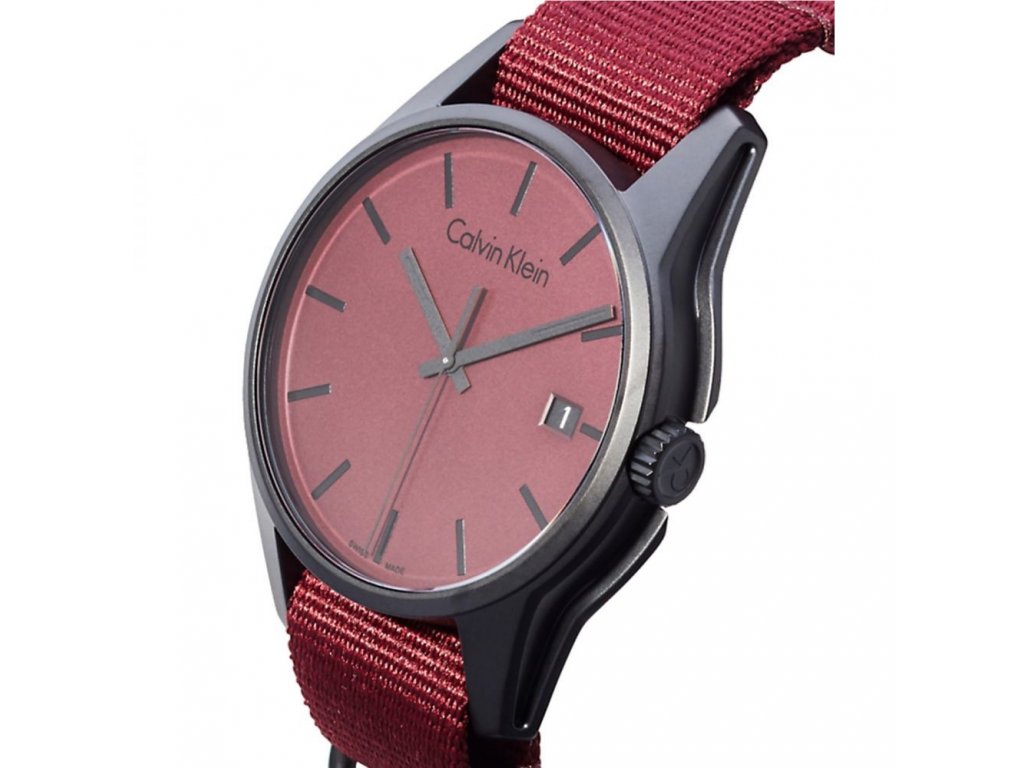 Calvin Klein Tone Collection K7K514UP watch angled view showing burgundy dial and black case with maroon strap