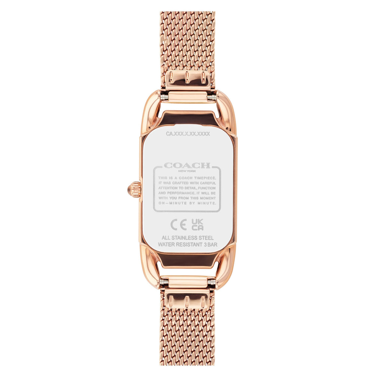 Coach watch caseback showing model number, regulatory marks, and stainless steel construction