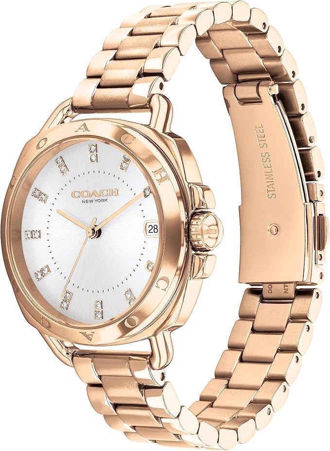 Coach rose gold bracelet watch shown from front and side view with white dial