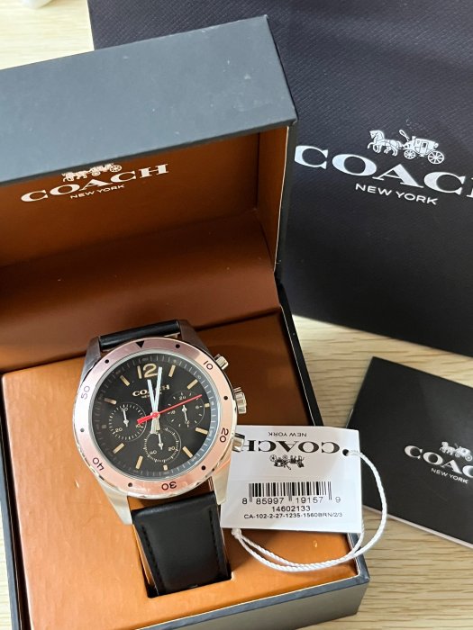 Coach watch 14602133 with original packaging, brown inner box, and black outer box