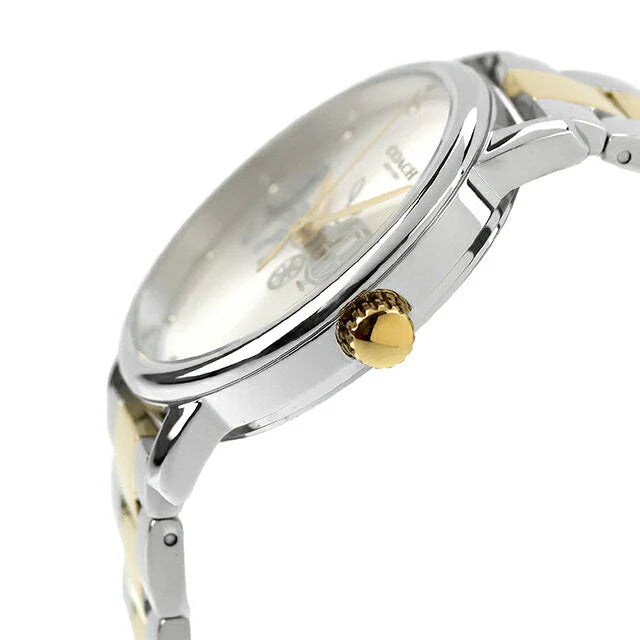 Side view of Coach watch showing 2-tone bracelet and gold-tone crown detail