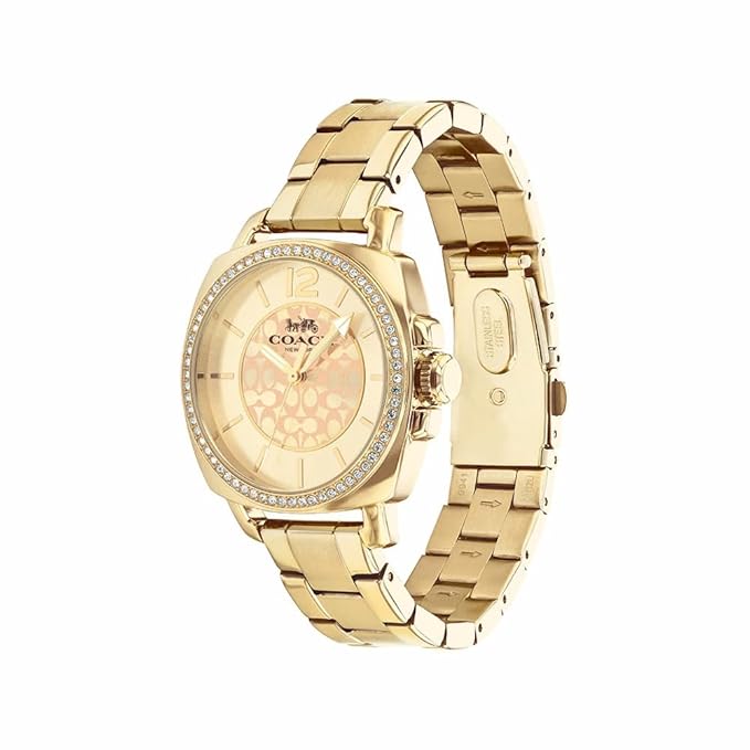 Coach Boyfriend watch three-quarter view showing crystal bezel and gold bracelet