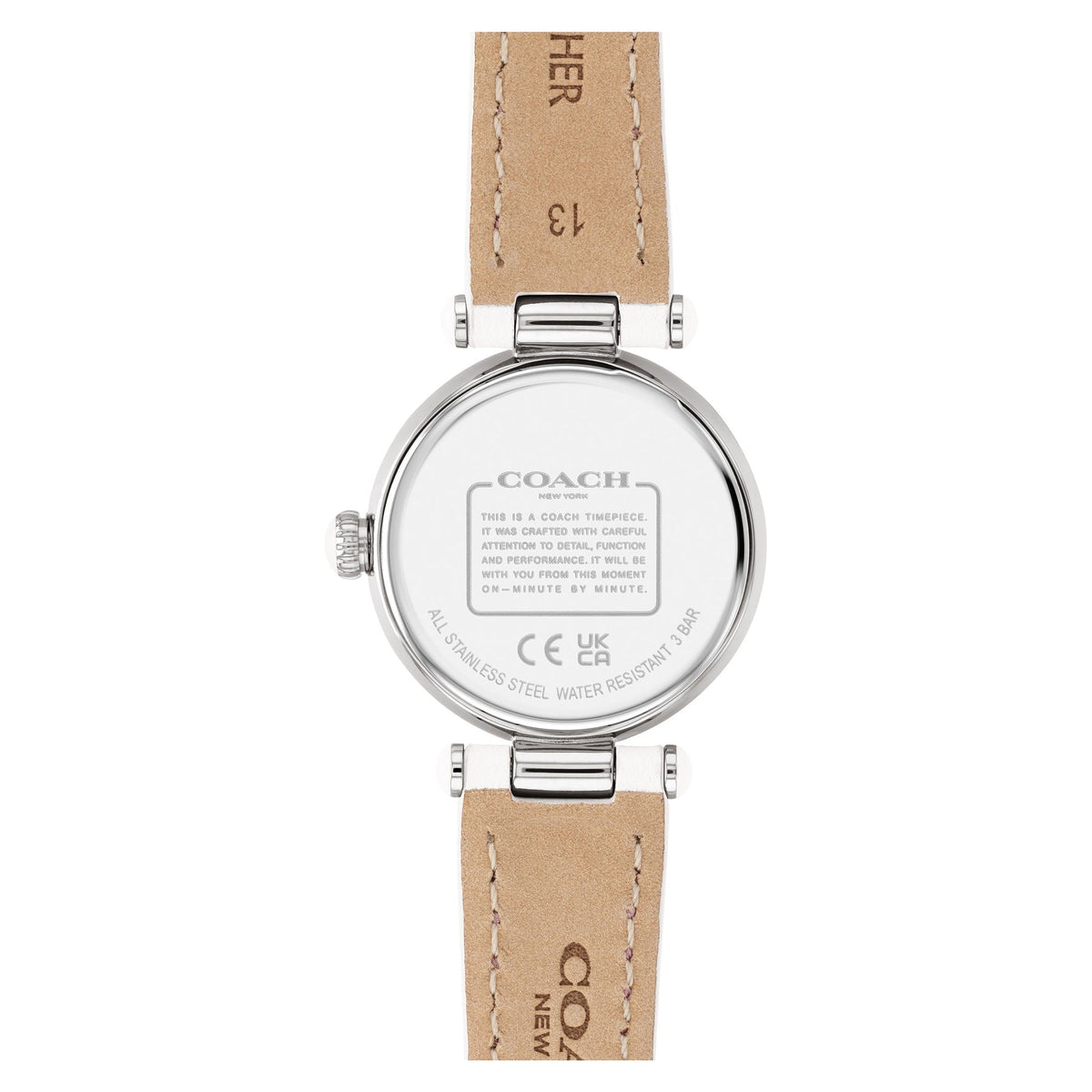 Coach Cary watch caseback showing engraved Coach branding and specifications on tan leather strap