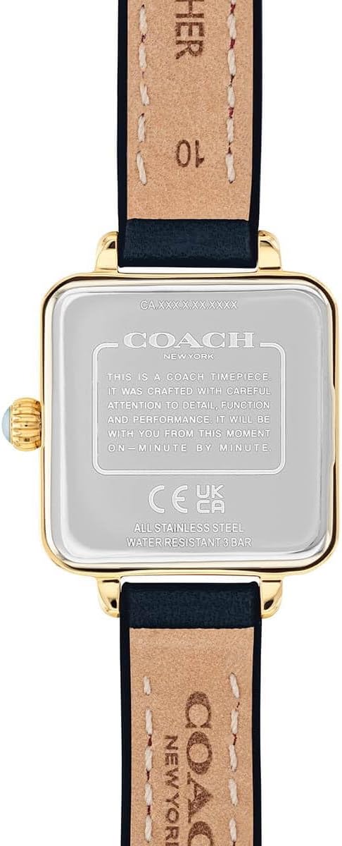 Coach Cass watch caseback showing engraved branding and specifications with gold-tone crown