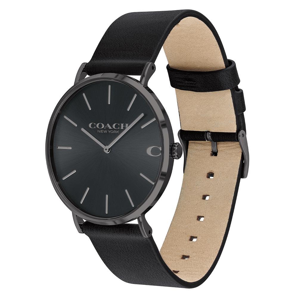 Coach Charles watch angled view showing black leather strap with tan suede interior and buckle closure