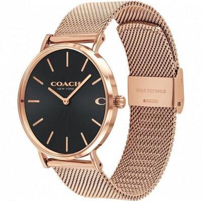 Coach Charles watch on wrist showing black dial and rose gold Milanese bracelet