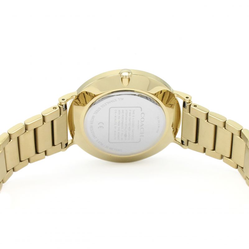 Side view of Coach Charles gold-tone watch with bracelet strap
