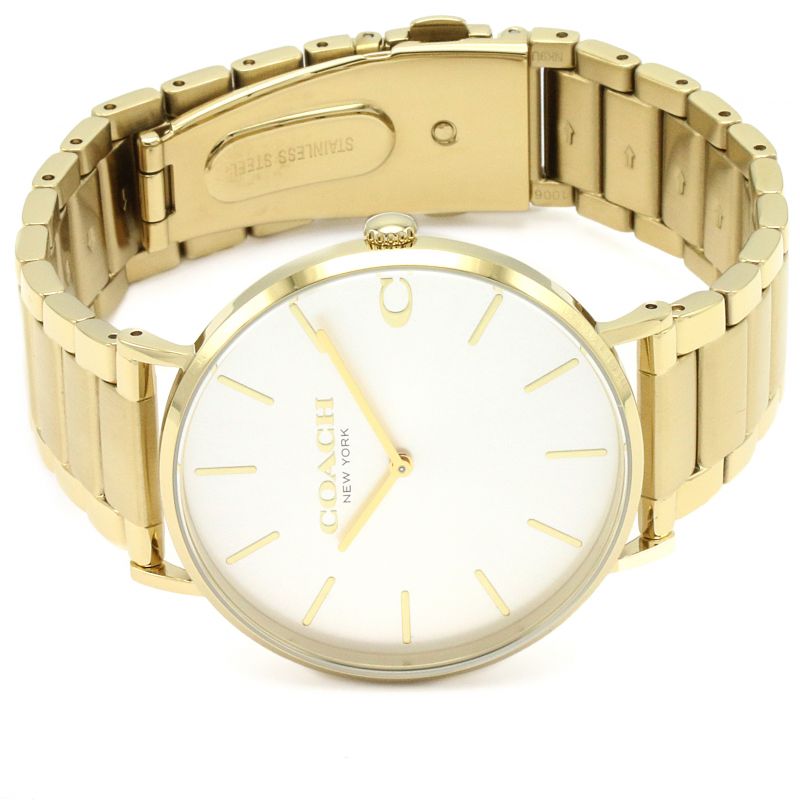 Coach Charles gold watch on wrist showing full bracelet and dial