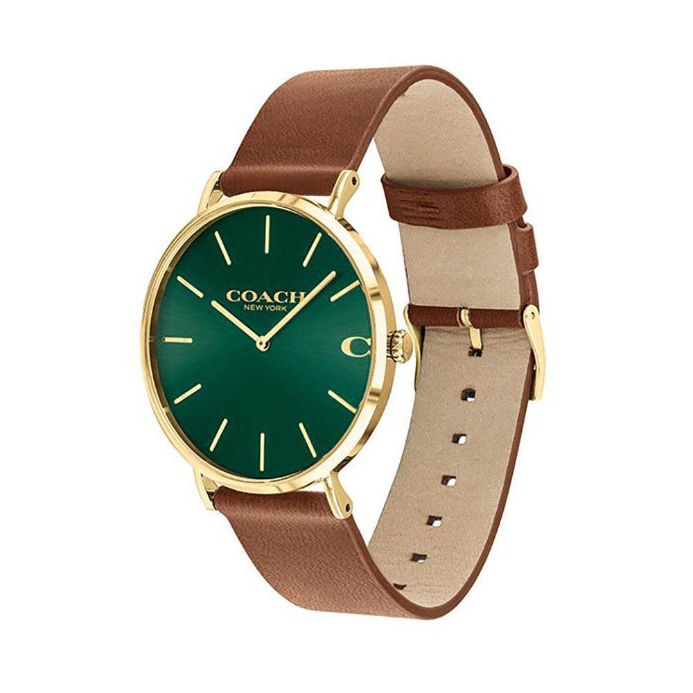Coach Charles green dial watch on wrist with brown leather band and gold-tone lugs