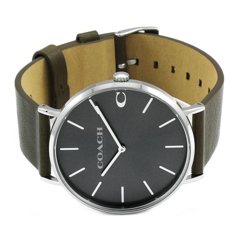 Coach Charles men's watch worn on wrist showing slate dial with khaki leather strap