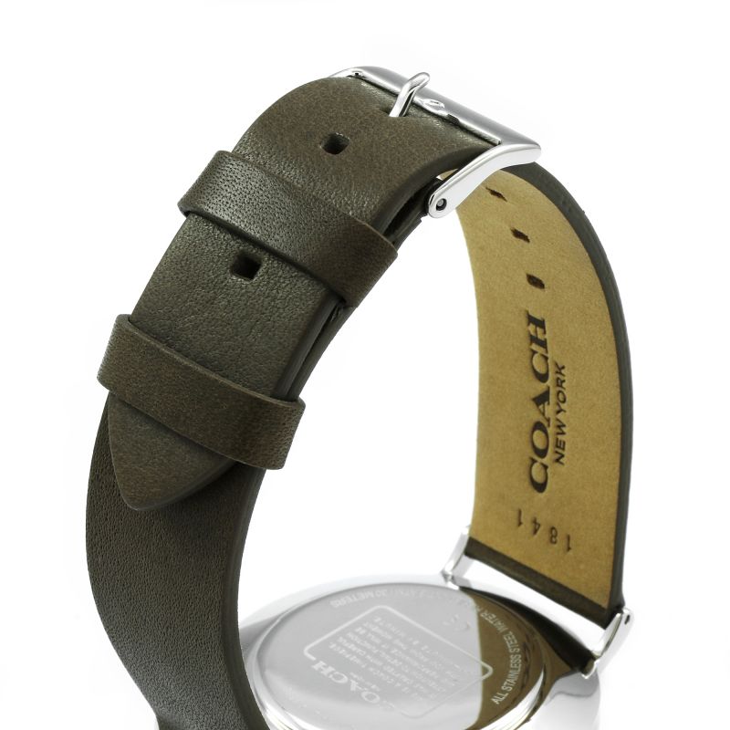 Coach Charles khaki leather strap with Coach branding and yellow suede lining detail