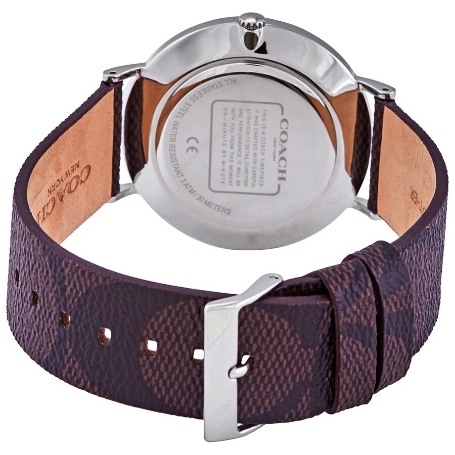 Coach Charles watch caseback showing silver case and tan leather interior