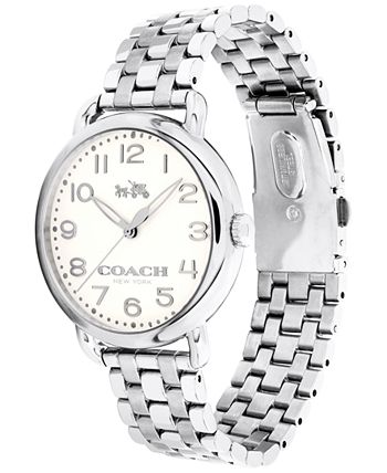 Coach Delancey watch shown from angle with silver steel bracelet and white dial visible