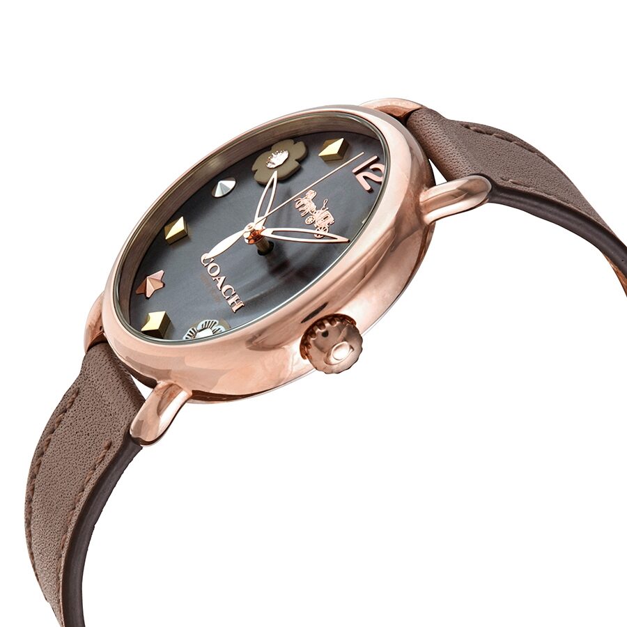 Coach Delancey watch angled side view showing case profile and decorative dial markers
