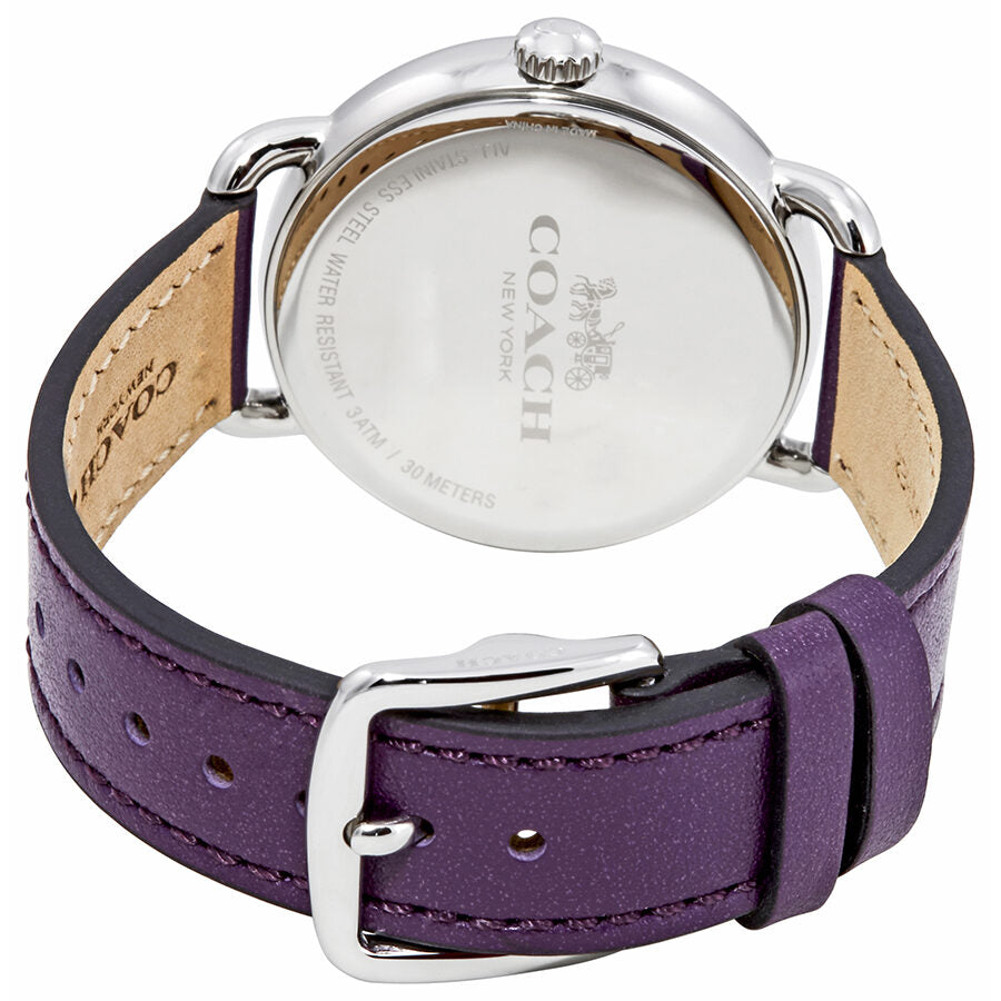 Coach Delancey watch caseback showing engraved Coach branding and tan leather inner strap