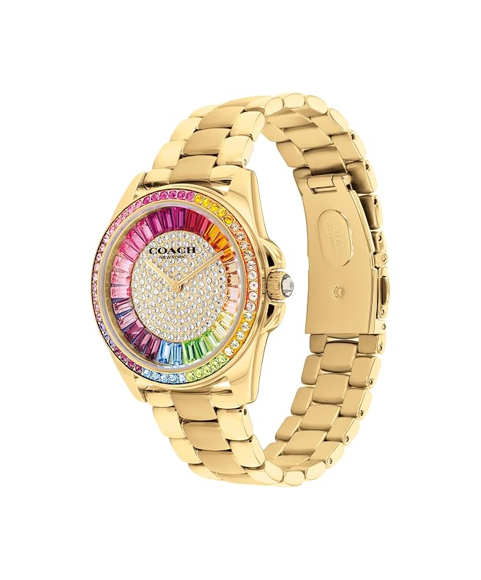 COACH Greyson watch side view showing rainbow crystal bezel and gold bracelet