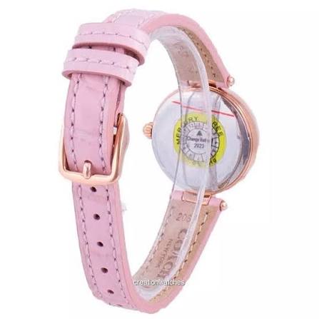 Coach Hayley watch on wrist showing pink leather strap and dial with diamond accents