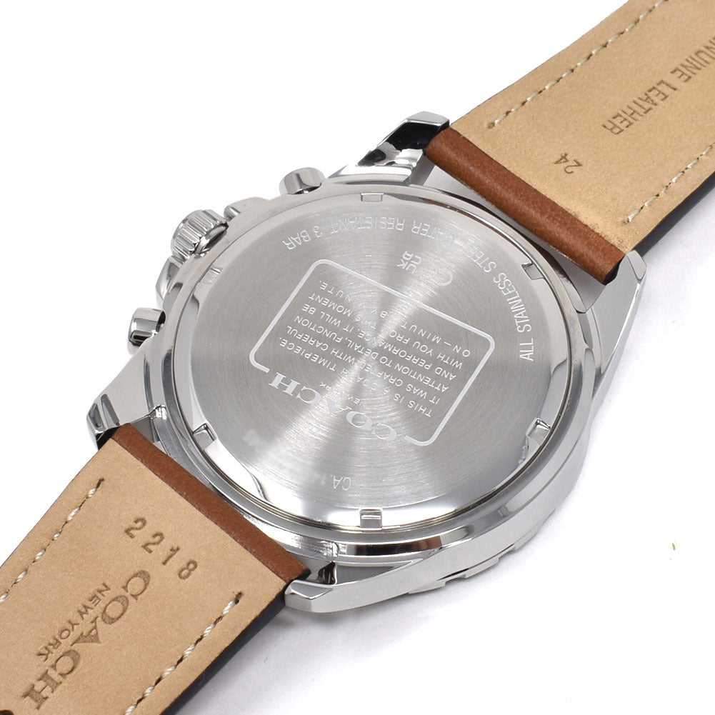 Stainless steel caseback of Coach Kent watch with engraved text and specifications