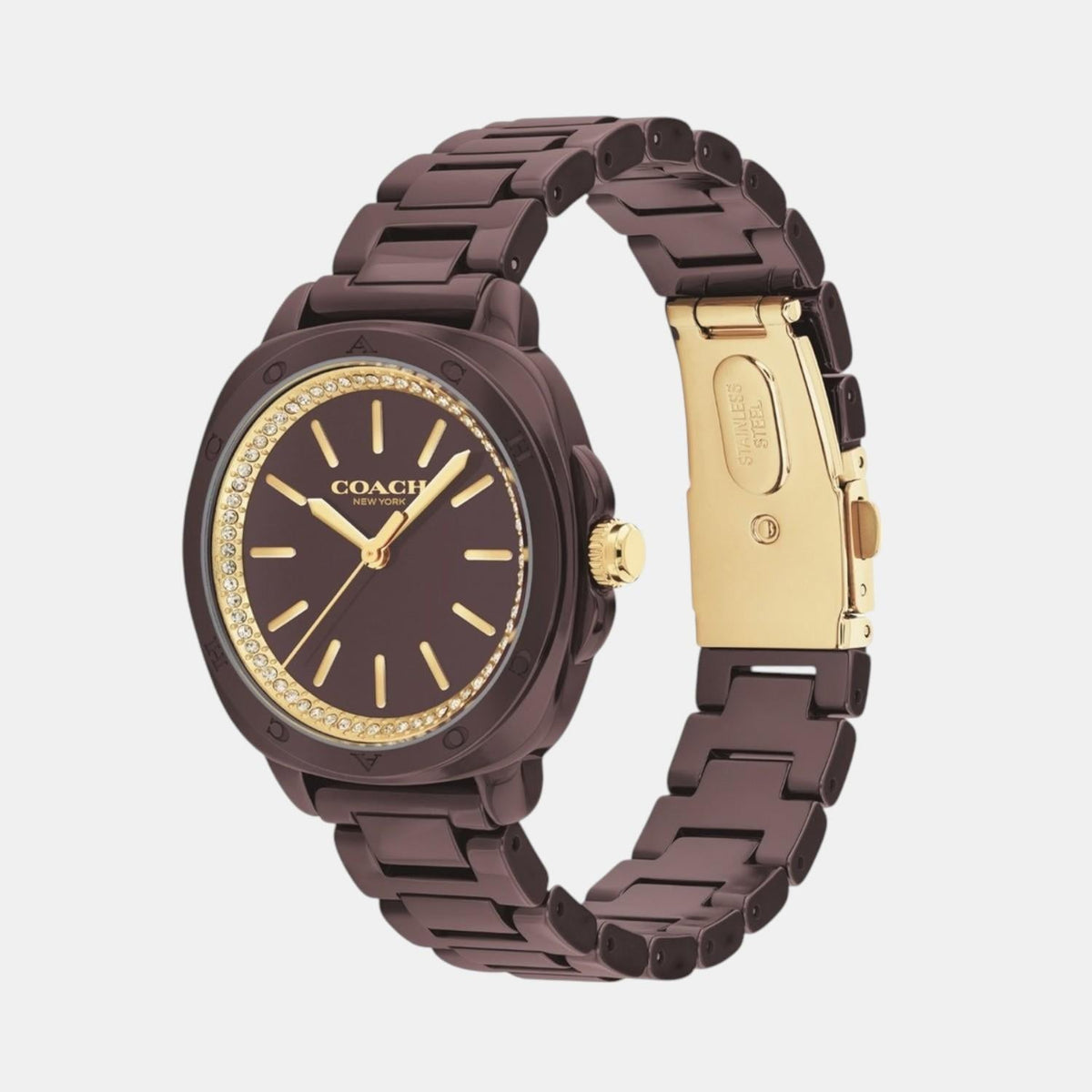 Coach Kitt women's watch showing brown ceramic bracelet with gold-tone clasp and dial detail