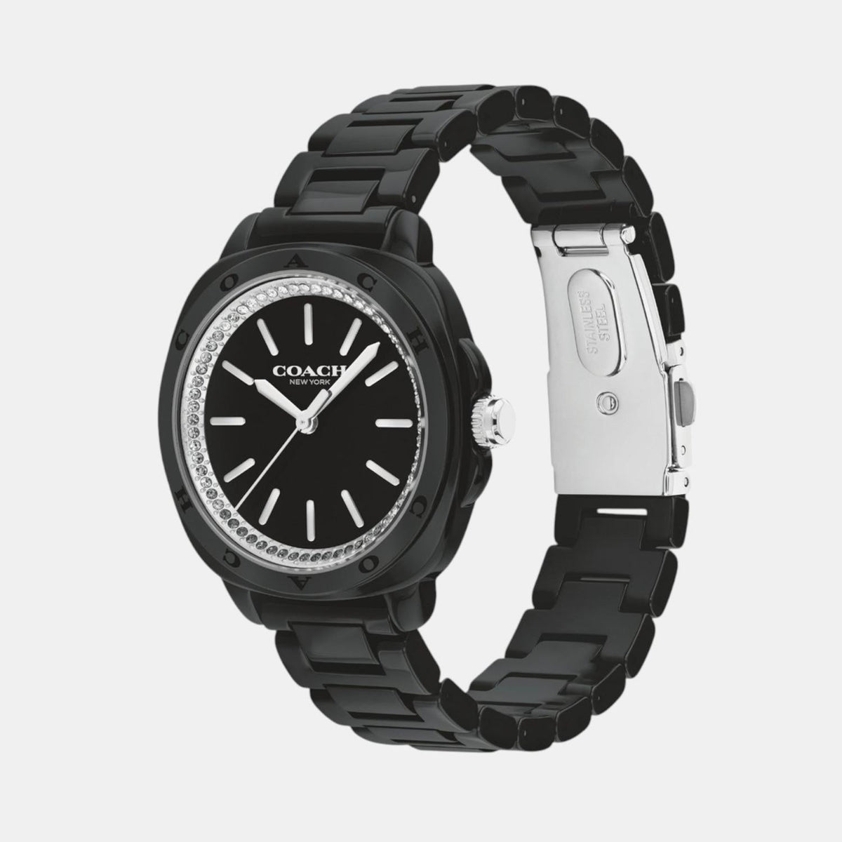 Coach Kitt ceramic watch shown from angled view with stainless steel clasp visible