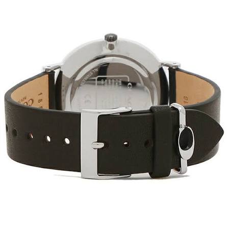 Coach Perry watch showing black leather strap with tan leather detail and silver buckle