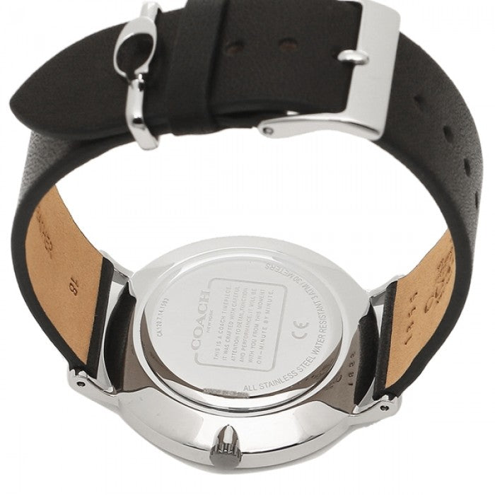 Coach Perry caseback showing tan leather interior and silver case closure
