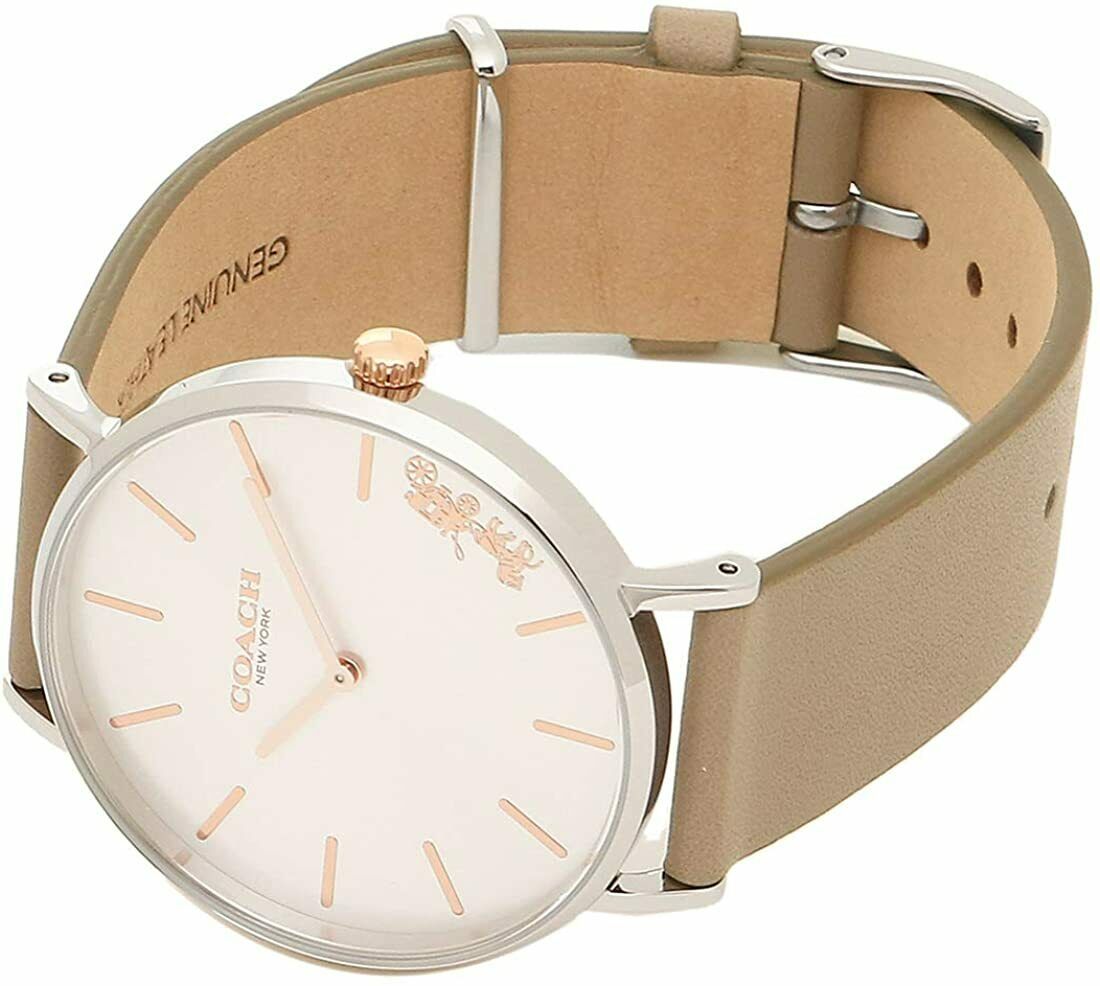 Coach Perry watch on wrist showing silver dial and tan leather strap