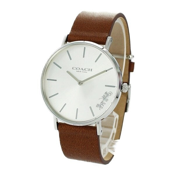 Coach Perry watch worn on wrist showing white dial and tan leather band