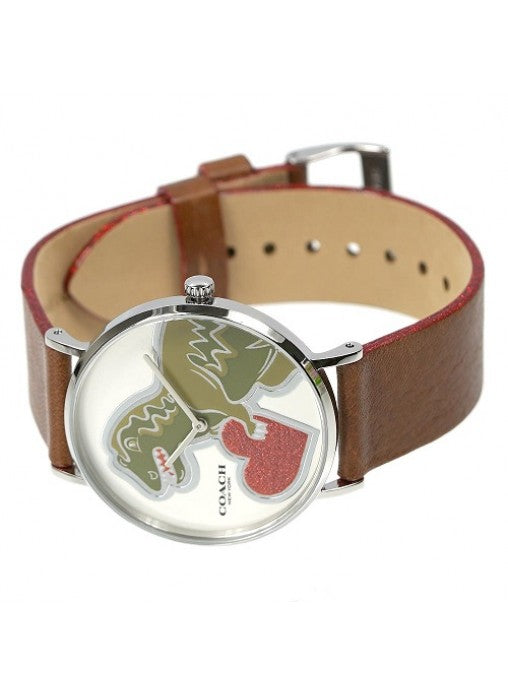 Coach Perry women's watch worn on wrist, showing dachshund motif dial and brown leather strap