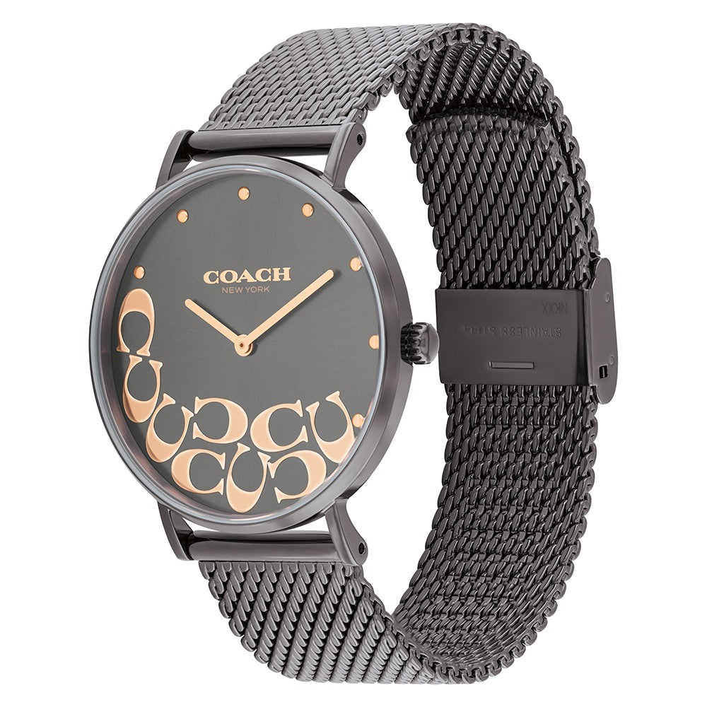 Coach Perry watch on wrist showing grey dial with gold logo design and mesh strap