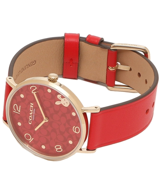 Coach Perry women's watch on wrist with red leather strap