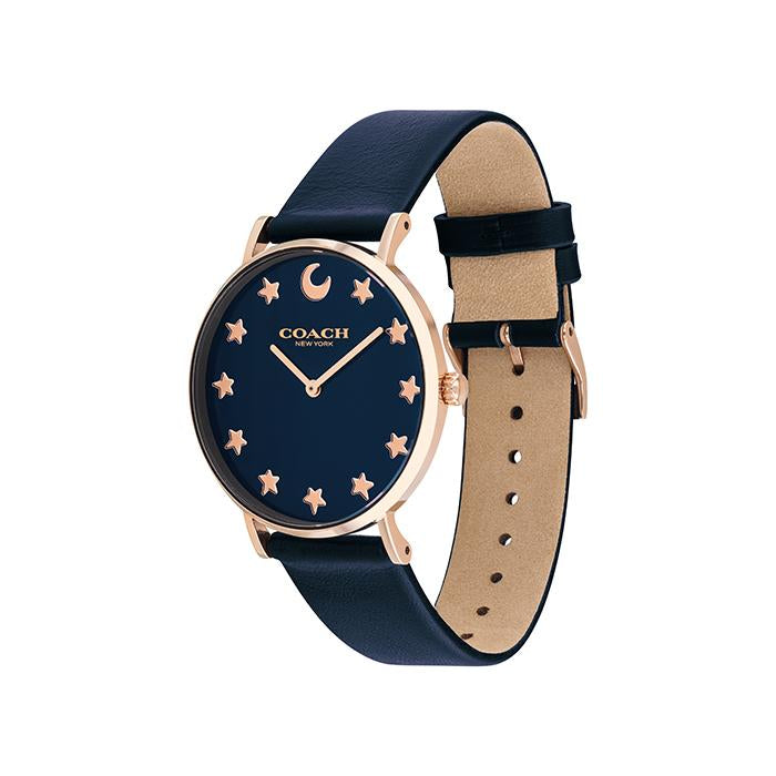 Coach Perry navy women's watch angled view showing rose gold case, navy leather strap, and tan interior lining