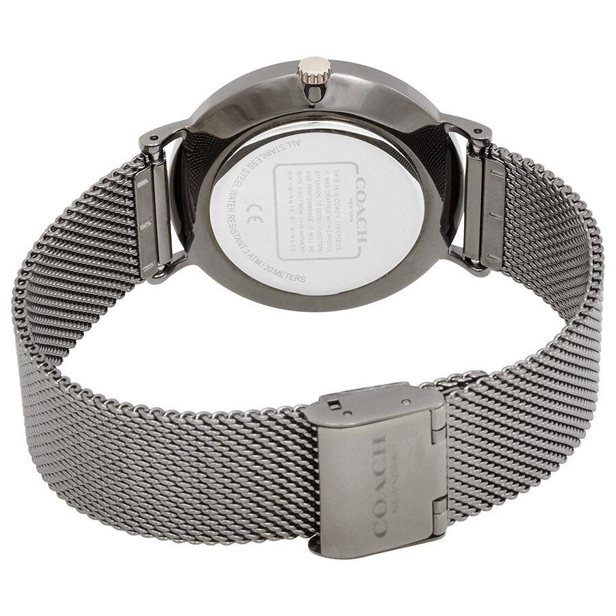 Coach Perry watch caseback showing gunmetal mesh strap and fold-over clasp closure