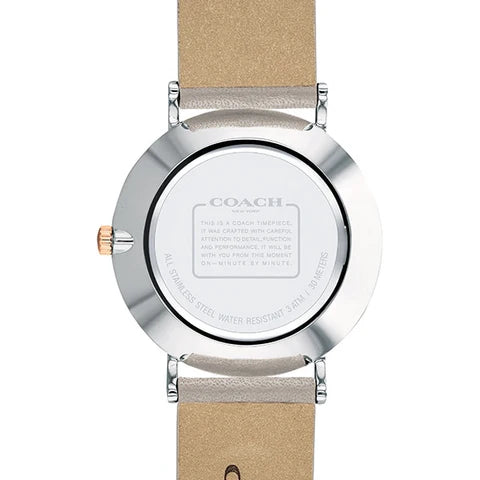 Coach Perry watch caseback showing dial engraving and taupe leather strap