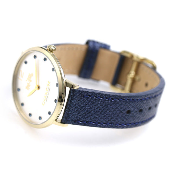 Coach Slim Easton watch at angle showing gold case, white dial, and blue leather strap detail