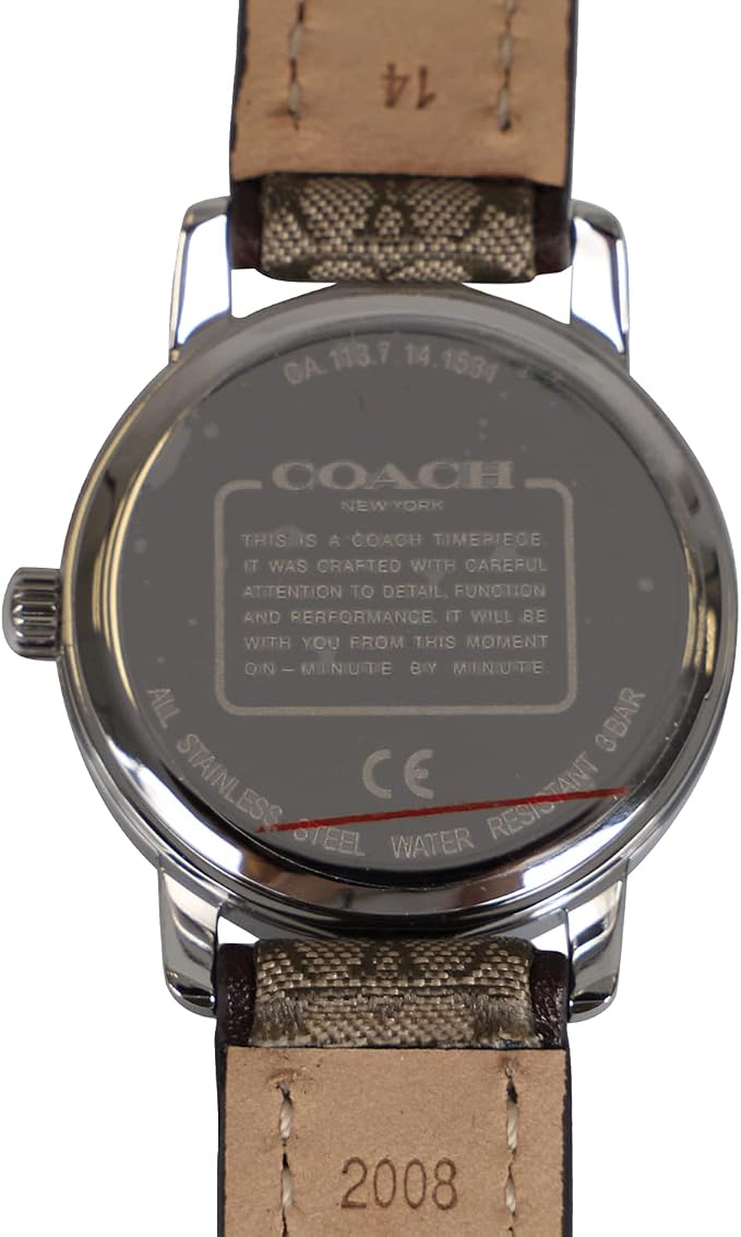 Coach watch caseback showing model number and specifications with tan leather strap