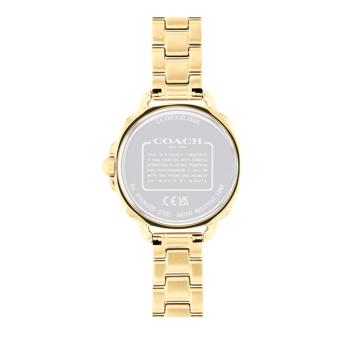 Coach Tatum watch caseback showing gold-tone stainless steel with engraved branding