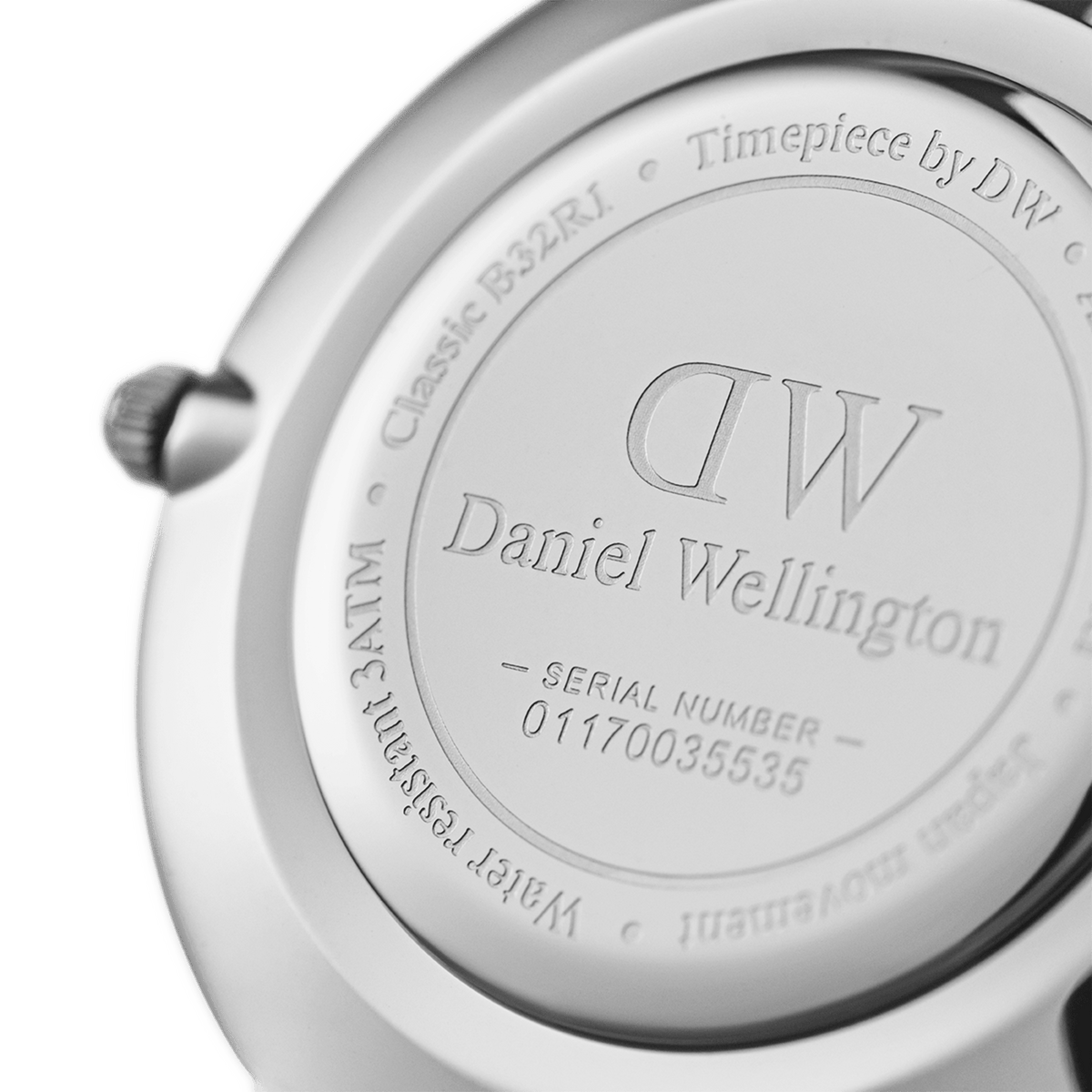 Daniel Wellington caseback with engraved logo, serial number 01170036335, and watch specifications