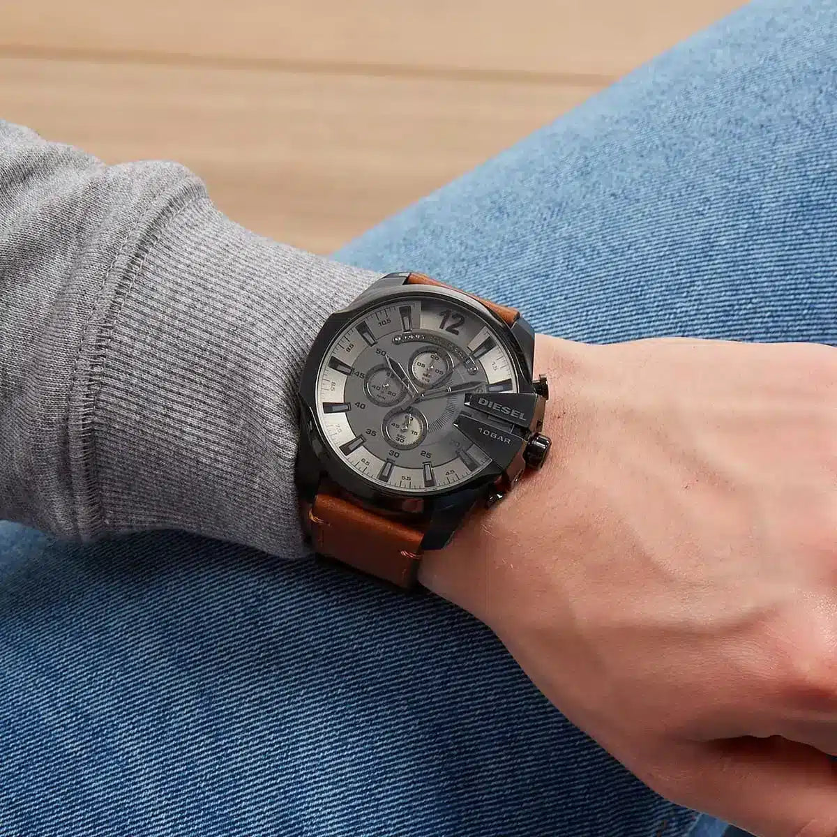 Diesel Mega Chief chronograph watch worn on wrist with brown leather strap