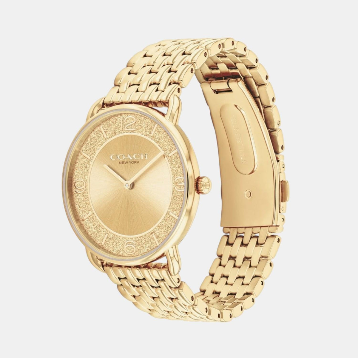 Side profile of Elliot gold watch with textured bezel and articulated link strap