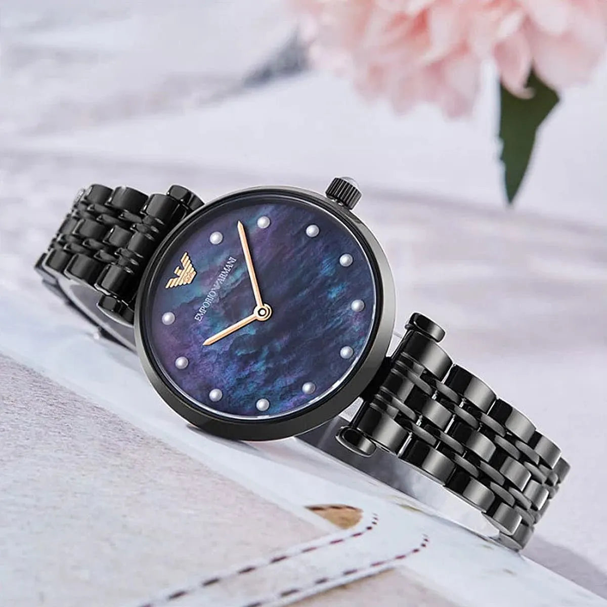 Emporio Armani AR11268 women's watch on wrist with navy dial and black bracelet