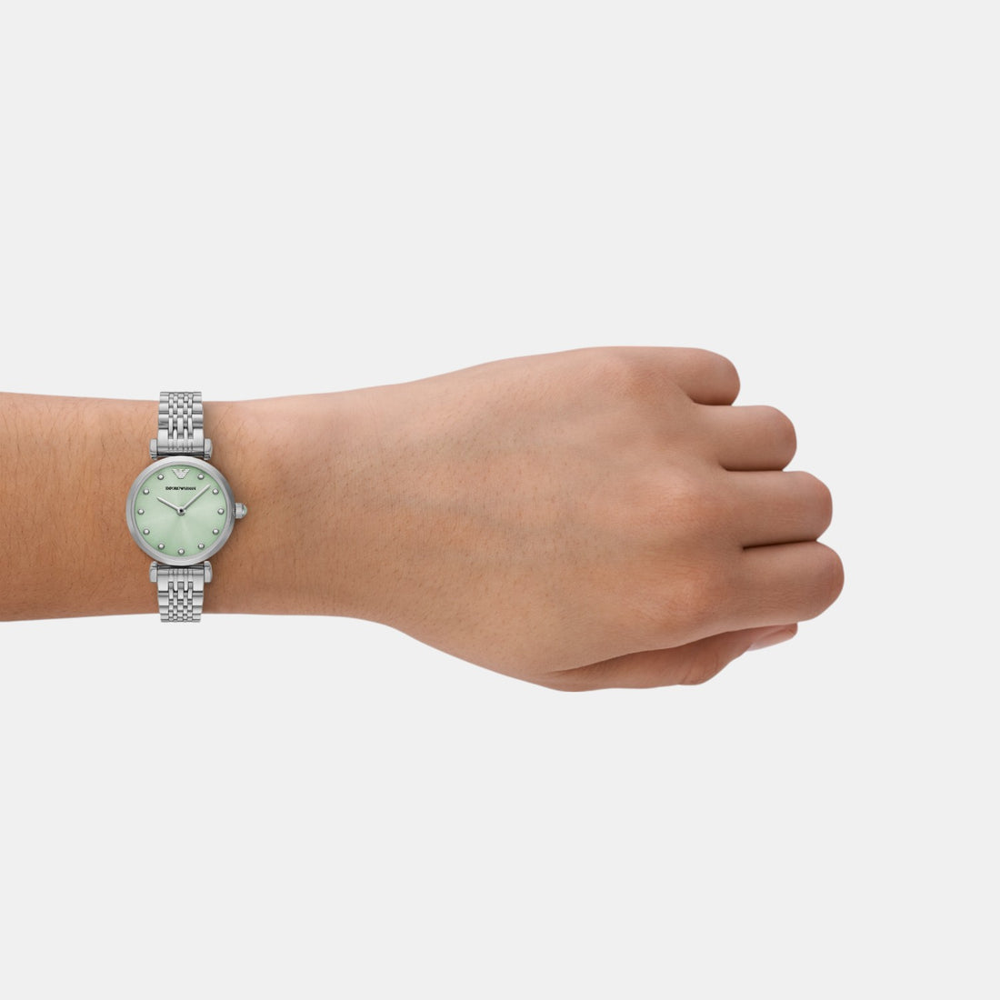 Emporio Armani AR11667 green dial watch worn on wrist, showing fit and appearance on arm