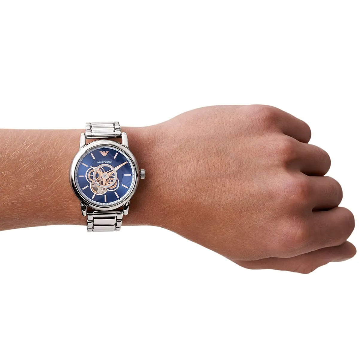 Emporio Armani Luigi chronograph skeleton watch worn on wrist with blue dial