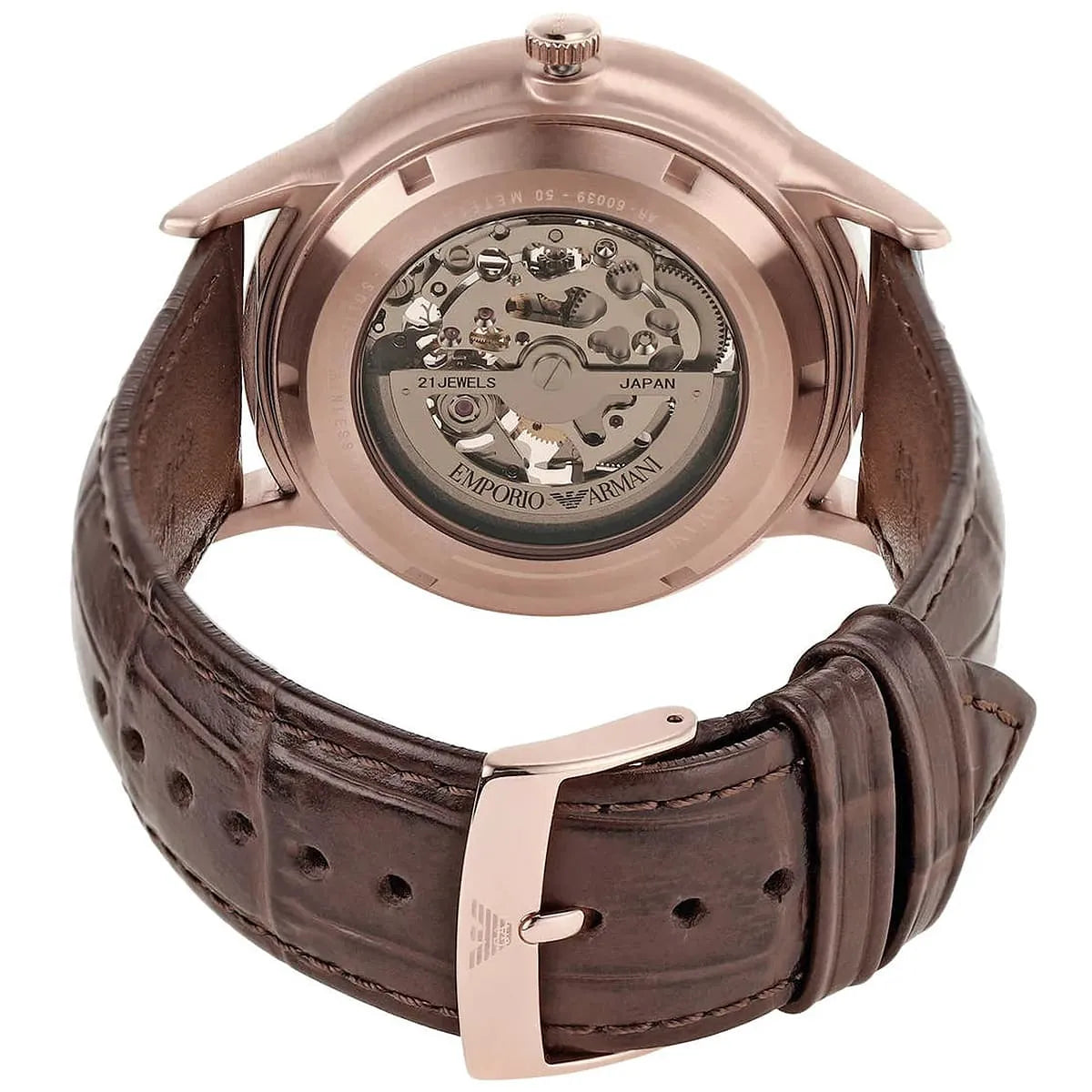 Emporio Armani Meccanico AR60039 skeleton dial watch with brown leather strap laid flat