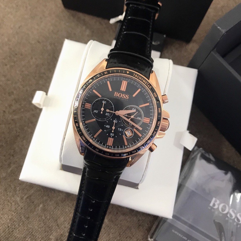 Hugo Boss rose gold chronograph watch displayed in white presentation box with packaging